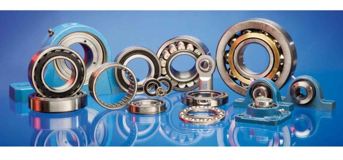 stainless steel bearings arranged on blue background